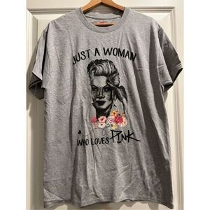 Just a Woman Who Loves Pink T-shirt size Medium